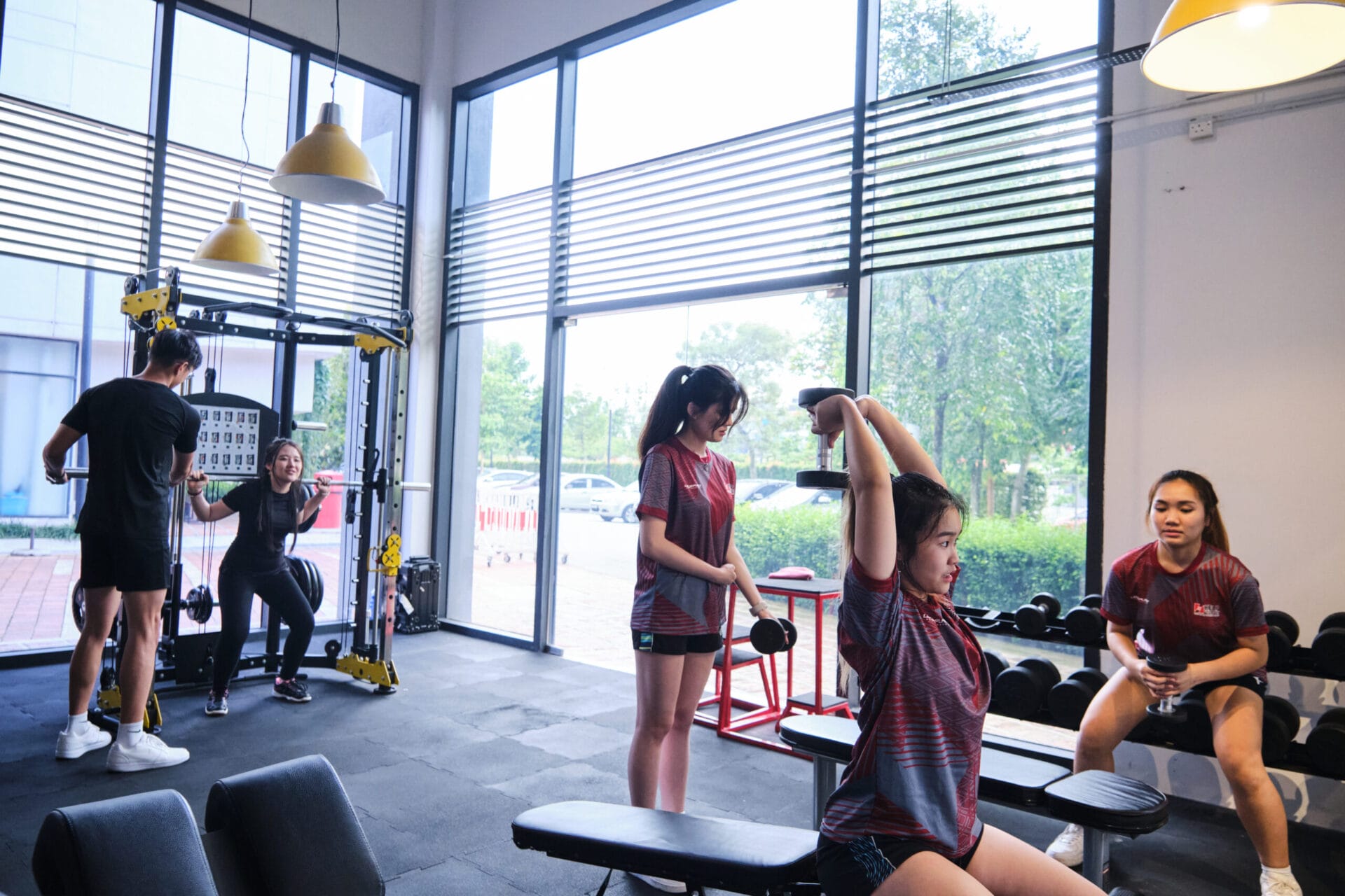 Students in HELP University's gym
